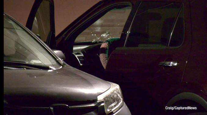 Victim's vehicle with a bullet hole in the windshield after a shooting that wounded two people in Waukegan on Wednesday, May 24, 2023 (PHOTO CREDIT: Craig/CapturedNews)