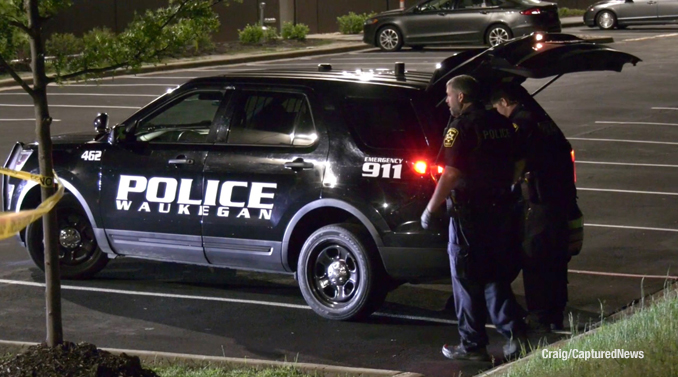 Waukegan police officers on scene of a shooting in Waukegan Wednesday, May 24, 2023 (PHOTO CREDIT: Craig/CapturedNews)