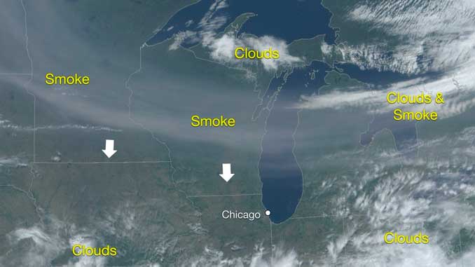 Upper level smoke from wildfires in Alberta is expected to be visible the next few days as possibly hazy/milky skies by day and a reddish pink tint to the sun at sunset through late week. Shown is an annotated regional satellite image. (SOURCE: NWS Chicago)