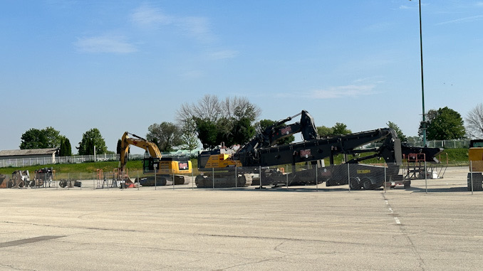 Heavy equipment in staging that will be used when the larger structural demolition begins.