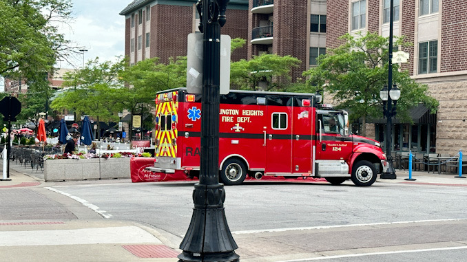 Arlington Heights Fire Department paramedics on the scene at Davis Street and Vail Avenue where a person was injured by an umbrella while high wind gusts were occurring