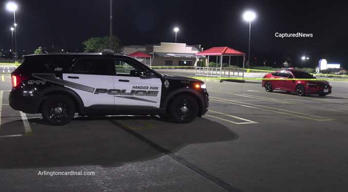 Hanover Park Police protecting the scene near the red Acura that Winder Cruz drove to the scene Thursday night before he was killed (CARDINAL NEWS)