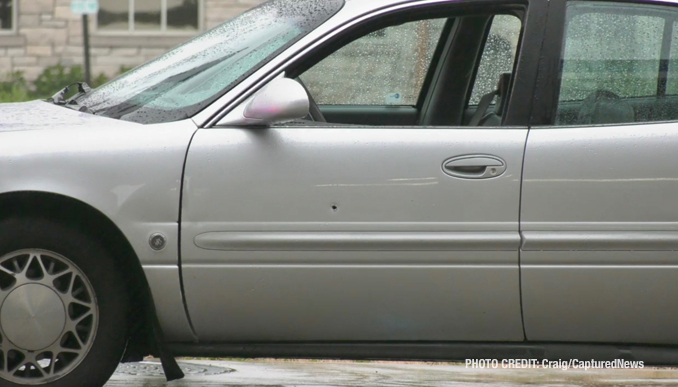 Bullet hole in the driver's door in a motorist's vehicle after the motorist was shot near Libertyville, Tuesday, June 13, 2023 (Craig/CapturedNews)