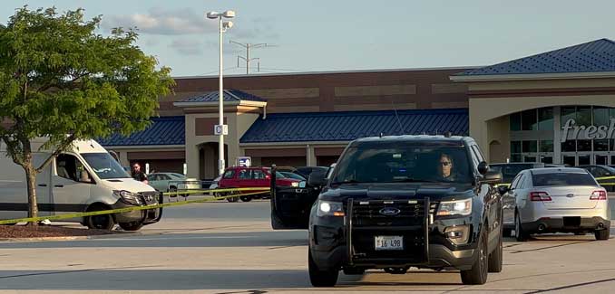 White Mercedes Sprinter van with perimeter secured at the scene of a death investigation at the Meijer store parking lot on Monday, July 17, 2023 (CARDINAL NEWS)