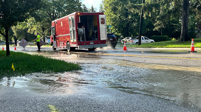 Water still bubbling up while Arlington Heights Public Works Department crews repair a water main break on westbound Euclid Avenue between Dryden Avenue and Arlington Heights Road Saturday morning, July 29, 2023