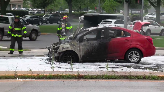 Car fire after firefighters extinguished a fire in a small red Chevrolet on Wednesday, July 26, 2023