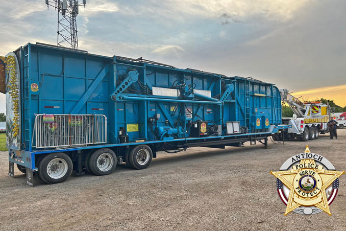 Moby Dick carnival ride connected to an Antioch Automotive rotator tow truck as police take possession for a criminal investigation (SOURCE: Antioch Police Department)