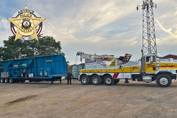 Moby Dick carnival ride connected to an Antioch Automotive rotator tow truck as police take possession for a criminal investigation (SOURCE: Antioch Police Department)