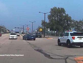 Police pursuit of blue Chevy Camaro in Wisconsin after it was carjacked on Caribou Crossing in Northbrook, Illinois (SOURCE: Pleasant Prairie Police Department dashcam)