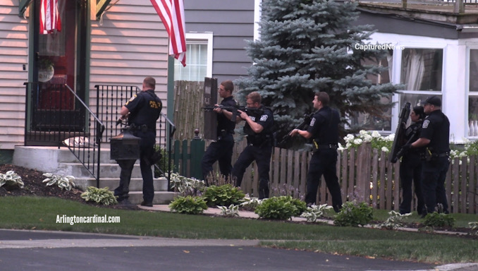 Arlington Heights police officers prepared to enter  a home on the south side of Campbell Street just west of downtown Arlington Heights after a 9-1-1 caller reported that he shot his wife on about 7:39 p.m. Saturday, August 5, 2023 (CARDINAL NEWS)