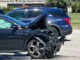 Black Volkswagen with severe front end damage at Rand Road and Wilke Road in Arlington Heights on Saturday morning, August 12, 2023.
