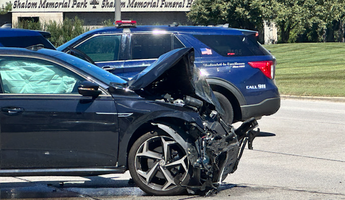 Black Volkswagen with severe front end damage at Rand Road and Wilke Road in Arlington Heights on Saturday morning, August 12, 2023.