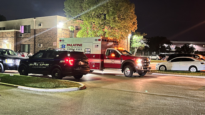 Palatine Fire Department ambulance on the scene in the parking lot at Rand Grove Village apartments on Friday, August 11, 2023 after a reported fight (CARDINAL NEWS)