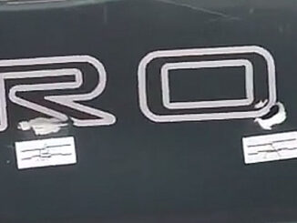 Two bullet holes near the 'R' and 'O' of "CHEVROLET" after a shooting at the Crave bar parking lot July 1, 2023 (Provided photo with source withheld)
