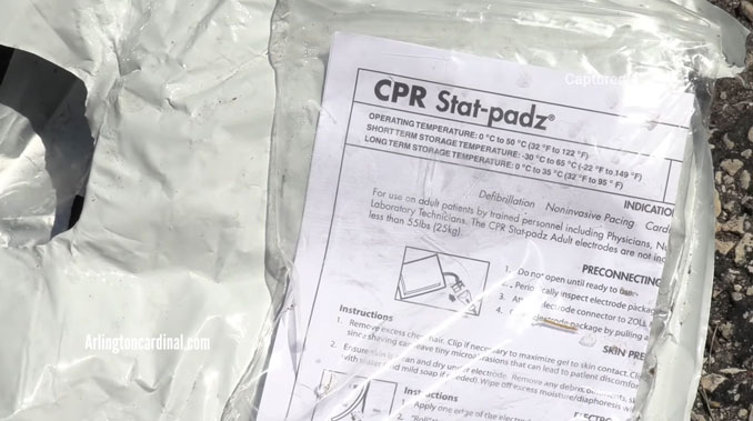 CPR Stat-padz® ECG/defibrillator electrodes wrapper at the scene where a shooting victim was found on Long Valley Drive over a mile from where the victim was fatally wound on Clear Creek Bay in Palatine (CARDINAL NEWS)