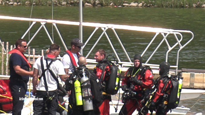 Divers safe out of the water immediately after recovering body from Lake Arlington on Friday, August 4, 2023.