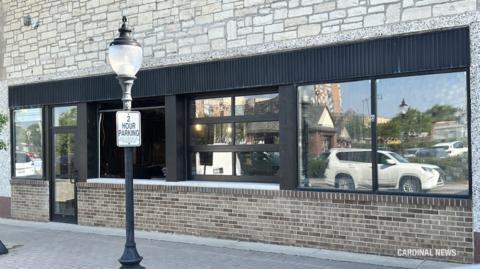 One window open and one window closed on June 8, 2023 during early remodeling of the Bird's Nest pub in downtown Arlington Heights (CARDINAL NEWS)