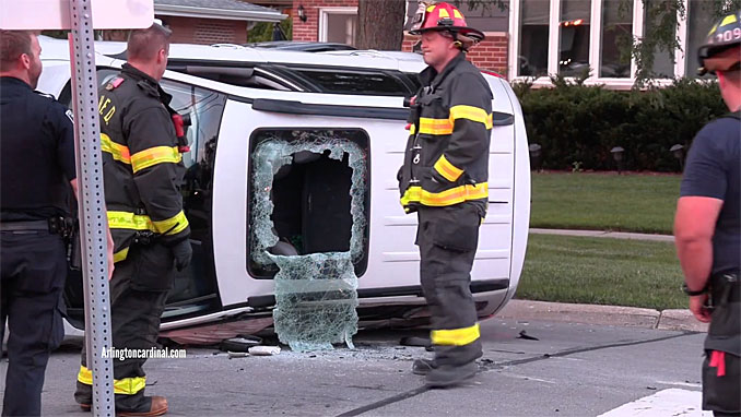 White Subaru SUV rolled over to the driver's side on Waterman Avenue just north of Kensington Road in Arlington Heights, Thursday evening, August 3, 2023 (CARDINAL NEWS)
