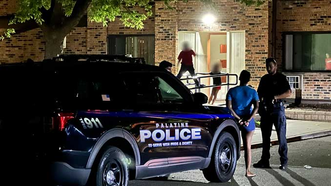 Woman detained and handcuffed while police officers investigate a report that a woman and her baby were 'pepper sprayed' on Friday night, August 11, 2023 (CARDINAL NEWS)