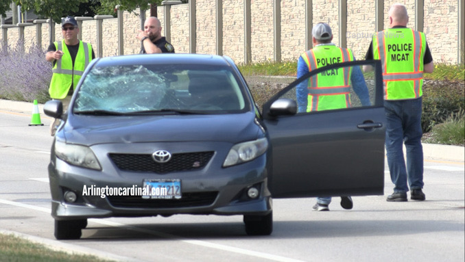 Toyota Corolla with windshield damage and hood damage after striking a bicyclist on Weiland Road north of Newtown Drive in Buffalo Grove, Wednesday morning September 6, 2023