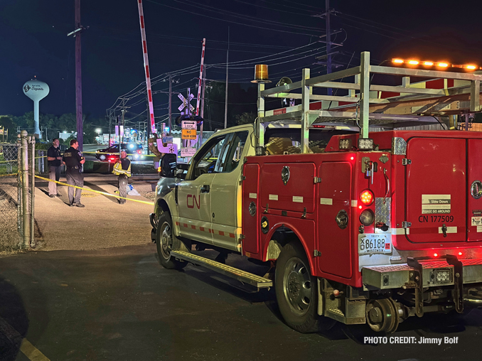 Canadian National crew at the scene where a Metra train struck and killed an elderly male pedestrian near Antioch Community High School Friday night September 1, 2023 (PHOTO CREDIT: Jimmy Bolf)