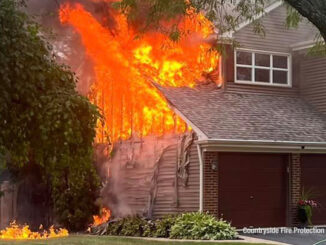 Fire from siding and roof of an attached garage at a house fire on Dearborn Lane in Vernon Hills on Monday, September 11, 2023 (SOURCE: Countryside Fire Protection District)