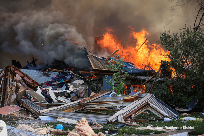 House burning after it was leveled by an apparent natural gas explosion on Monday, October 9, 2023 (SOURCE: Woodstock Fire/Rescue District)