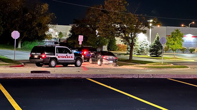 Police officers positioned at the intersection of Salem Drive and Colony Lake Drive in Schaumburg near Hoffman Estates overnight Friday and Saturday, October 20-22, 2023