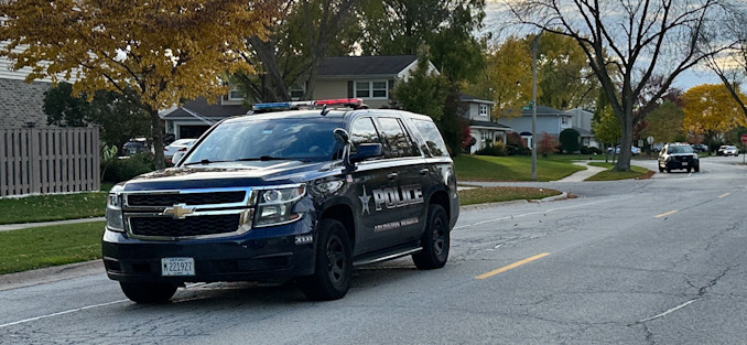 Arlington Heights police officers on extra patrol in the neighborhood south of Central Road and west of Arlington Heights Road after a wanted suspect that was possibly armed was in the neighborhood Tuesday, October 24, 2023