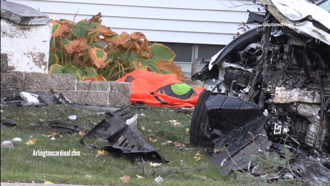 A Halloween decoration deflated after a crash caused the destruction of the front porch of a home and a white Lexus sedan, and the death of its driver on Monday, October 30, 2023