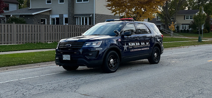Arlington Heights police officers on extra patrol in the neighborhood south of Central Road and west of Arlington Heights Road after a wanted suspect that was possibly armed was in the neighborhood Tuesday, October 24, 2023