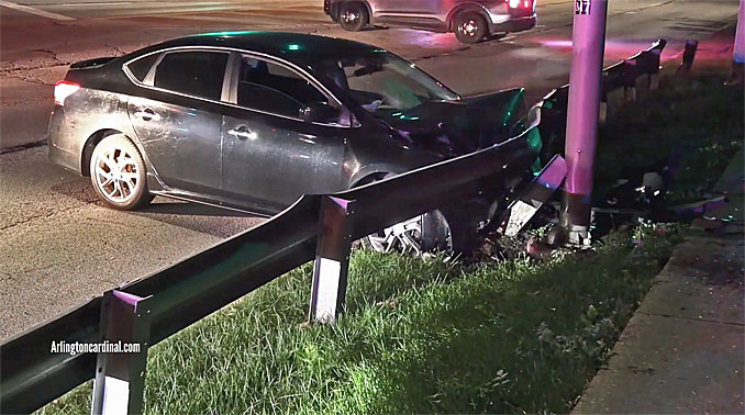 A Nissan Altima after a crash into a guardrail at Wilke Road and Kirchoff Road in Arlington Heights near Rolling Meadows Sunday, October 8, 2023