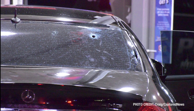 Bullet hole in the rear window of a black Mercedes sedan at the Citgo gas station at the southeast corner of Rollins Road and Cedar Lake Road on Wednesday night, October 4, 2023 (PHOTO CREDIT: Craig/CapturedNews)