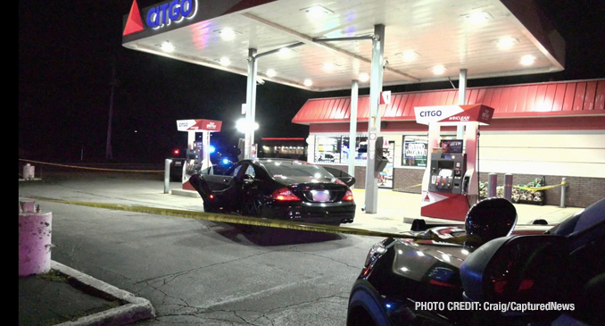 Black Mercedes sedan found with a bullet hole in the rear window at the Citgo gas station at the southeast corner of Rollins Road and Cedar Lake Road on Wednesday night, October 4, 2023 (PHOTO CREDIT: Craig/CapturedNews).