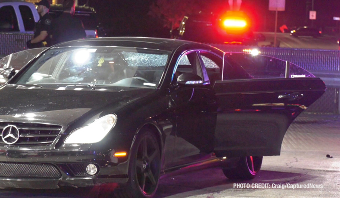 Black Mercedes sedan found with a bullet hole in the rear window at the Citgo gas station at the southeast corner of Rollins Road and Cedar Lake Road on Wednesday night, October 4, 2023 (PHOTO CREDIT: Craig/CapturedNews)