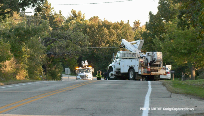 ComEd at crash scene on Gilmer Road south of Erhart Road Saturday evening, October 7, 2023 (PHOTO CREDIT: Craigh/CapturedNews).