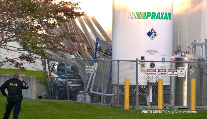 A wrecked Ford Explorer near a tank with refrigerated liquid nitrogen and a tank with oxygen on Sunday, October 22, 2023 (Craig/CapturedNews)