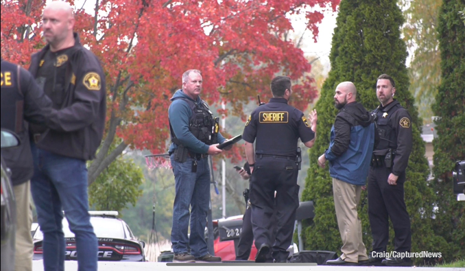 Round Lake Beach police and Lake County MCAT on scene after a sledge hammer attacker was shot and killed by police on Wednesday, October 25, 2023 (PHOTO CREDIT: Craig/CapturedNews)