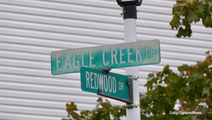 The intersection of Redwood Drive and Eagle Creek Drive where paramedics met the two injured female adults who were extracted by police at a house north of the intersection (Craig/CapturedNews)