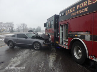 The driver of a blue Ford Mustang crashed into a Lake Forest Fire Engine on Route 41 during light snowfall on Sunday morning November 26, 2023 (SOURCE: Lake Forest Fire Department)