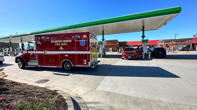 Arlington Heights Fire Department Ambulance 3 and crew at the BP gas station at Arlington Heights Road and Algonquin Road in Arlington Heights Road before transporting a battery victim and victim of a hit-and-run to Northwest Community Hospital on Saturday, November 18, 2023 (CARDINAL NEWS)