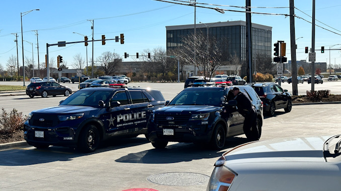 Arlington Heights Police Department squads on scene at the BP gas station at Arlington Heights Road and Algonquin Road in Arlington Heights Road investigating report of a battery and hit-and-run that occurred on Saturday, November 18, 2023 (CARDINAL NEWS)