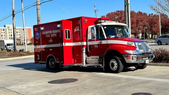 Arlington Heights Fire Department Ambulance 3 and crew at the BP gas station at Arlington Heights Road and Algonquin Road in Arlington Heights Road before transporting a battery victim and victim of a hit-and-run to Northwest Community Hospital on Saturday, November 18, 2023 (CARDINAL NEWS)