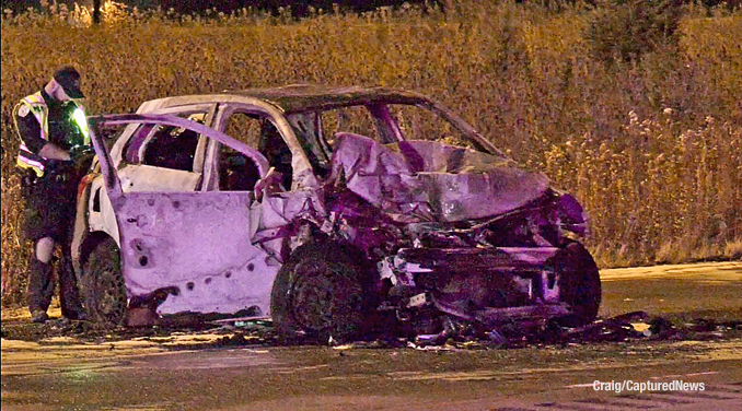 Heavy damage and fire damage to the vehicle that struck a Gurnee Police Department SUV while it was stopped behind another vehicle in the southbound lanes of Route 41 between Washington Street and Route 120 late Thursday night, November 9, 2023 (PHOTO CREDIT: Craig/CapturedNews)