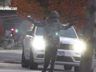 Taunting motorists in traffic on Northwest Highway near Miner Street, Sunday, November 19, 2023 about 6:30 a.m.