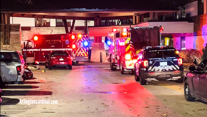 An ambulance, a fire engine, and several police vehicles on scene to help a victim of an apparent drug overdose at Suburban Studios in Arlington Heights on Tuesday evening, December 5, 2023