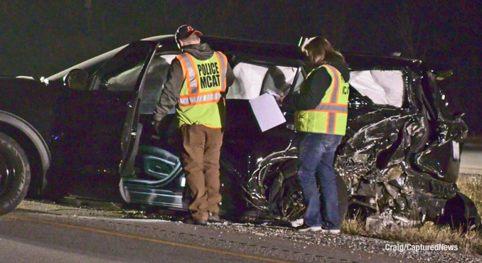 Park City Police Department Ford Interceptor SUV rear-ended on a traffic stop around midnight Saturday, December 16, 2023 (Craig/CapturedNews)