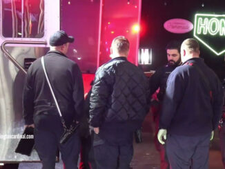 Police and paramedics meet immediately after H.O.M.E. Bar was transported by EMS and before police officer was transported around just 4:00 a.m. Sunday, December 17, 2023 (CARDINAL NEWS)