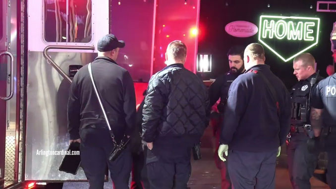 Police and paramedics meet immediately after H.O.M.E. Bar was transported by EMS and before police officer was transported  around just 4:00 a.m. Sunday, December 17, 2023 (CARDINAL NEWS)