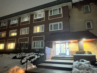 Three-story condominium building at 2700 Bel Aire Drive in Arlington Heights (CARDINAL NEWS).